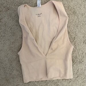 Urban outfitters pink out from under tank top